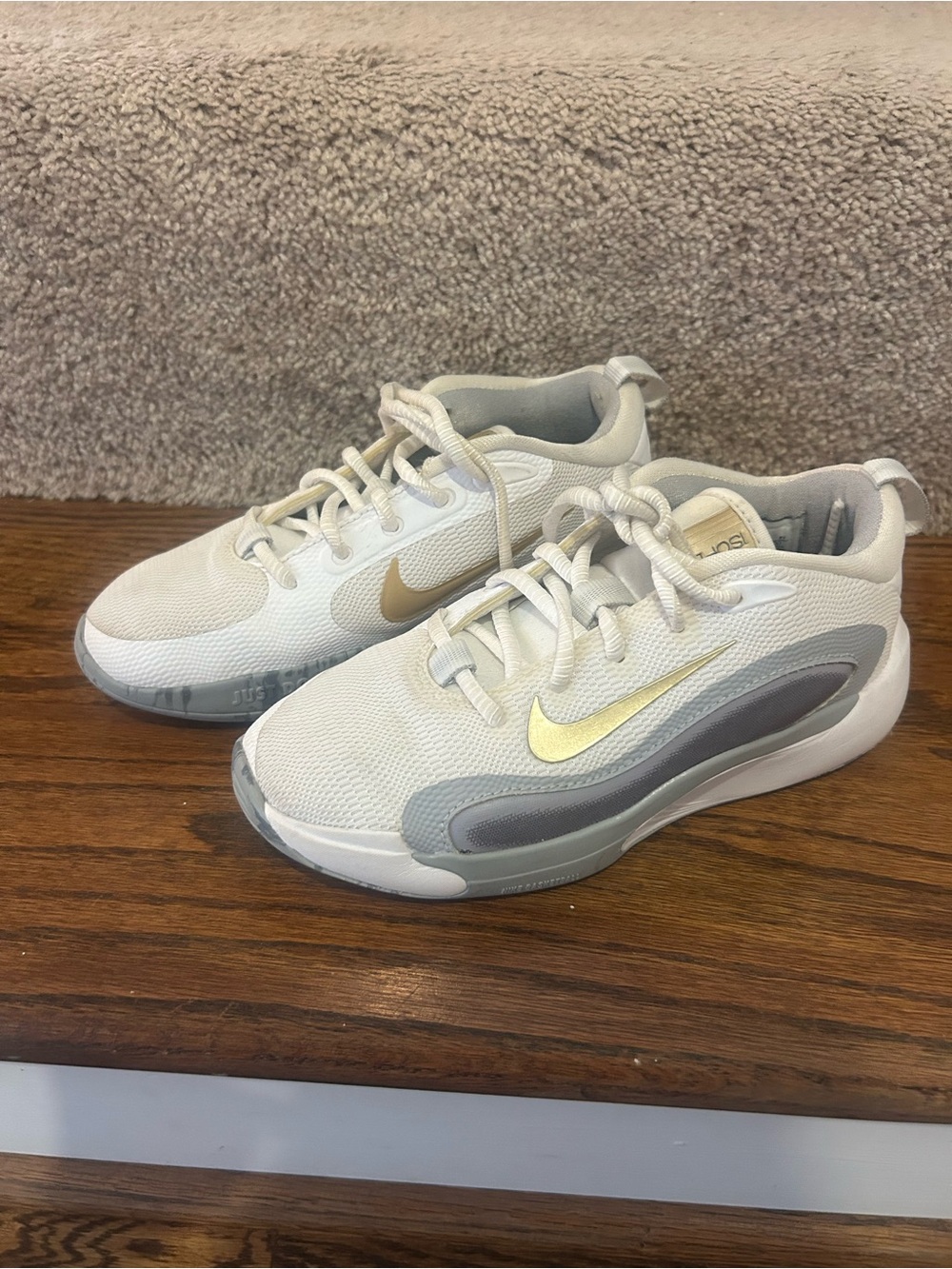 Nike Kids White and Gold basketball shoes with Gray Accents